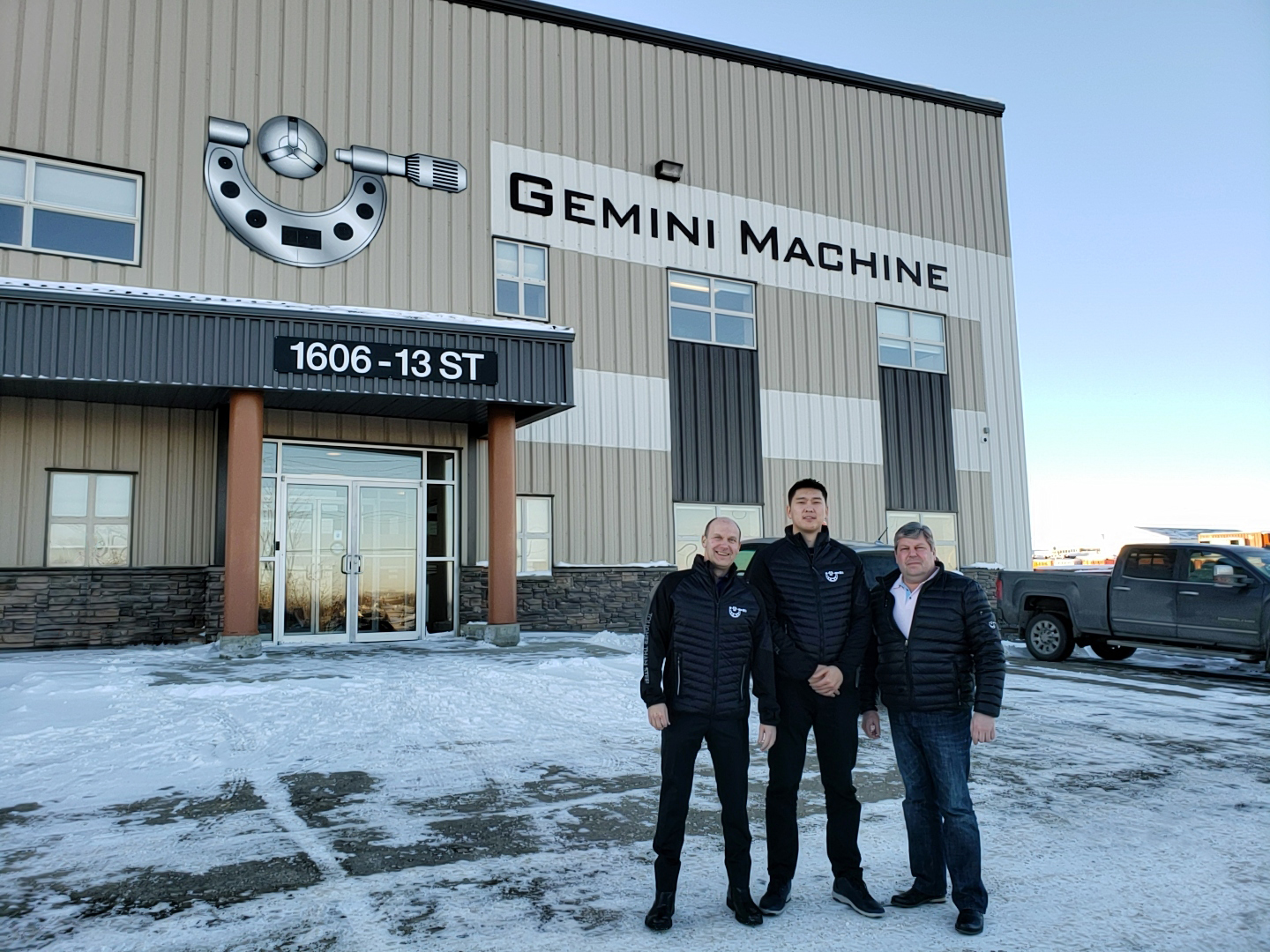 Chris Neitsch, Mike Walchuk and Mongolian Trade Commissioner Outside Gemini